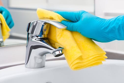 Cleaning limescale from the bathroom taps
